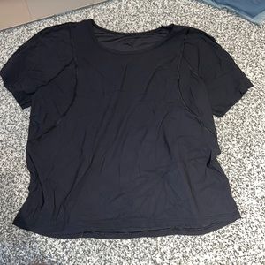 Black Lululemon short sleeve workout shirt. Size 4